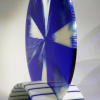 Blue and White Radiant Disk in Glass Stand