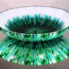Green and Blue Convergence Bowl on Mirror Surface