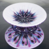 Blue and Purple Starburst Convergence Bowl on Glass Stand on Mirror Surface